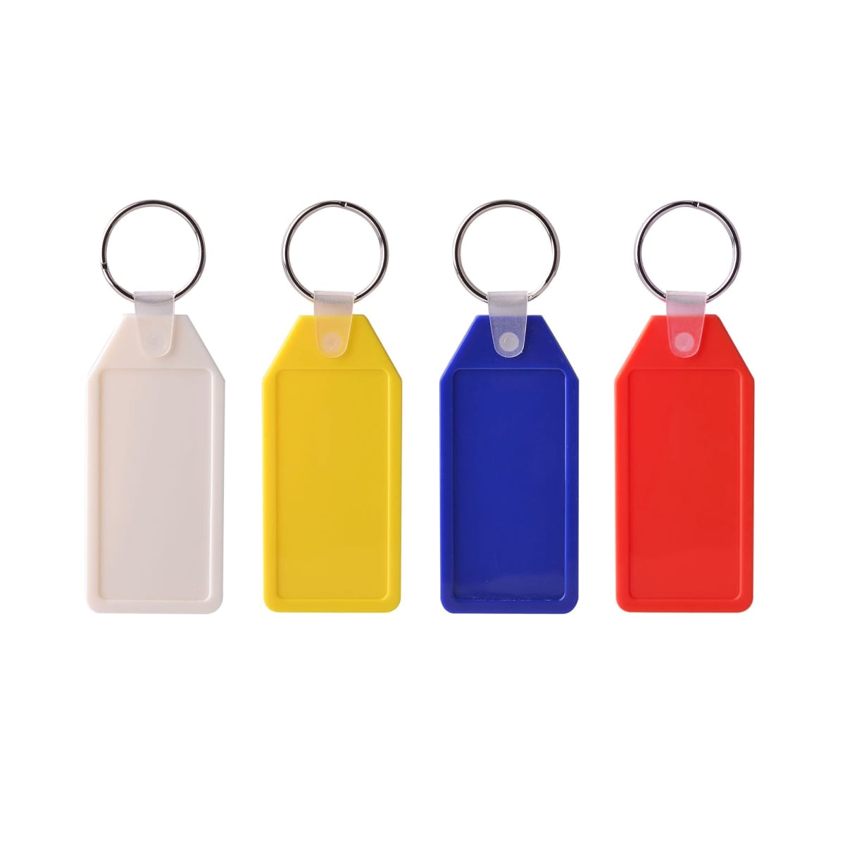 Four blank key tags in white, yellow, blue, and red are lined up against a white background. Each tag features a metal key ring attached at the top.