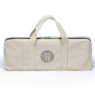 A rectangular beige canvas bag with dual handles and a black zipper. It features a round emblem with crossed kitchen utensils and the text Cooking Guild.