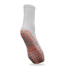 Gray athletic sock with a reinforced sole and square red anti-slip grips. The sock is shown from the bottom, slightly angled to highlight the grips.