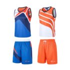 Two sleeveless sports uniforms displayed side by side. The left set is navy, blue, black, and orange with a white waistband. The right set is orange and white with a polka-dot pattern. Both include a tank top and shorts with logos on the chest and shorts.