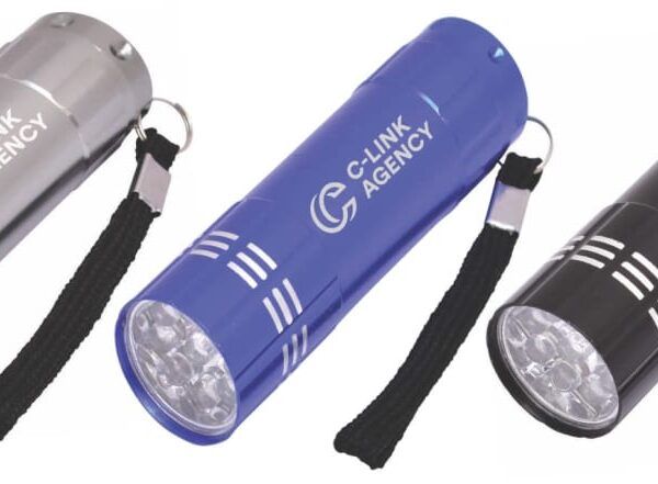 Three small, cylindrical flashlights are shown in silver, blue, and black, each with a logo that reads C-LINK AGENCY and a wrist strap attached to the end.