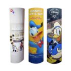 Three vertical advertising displays. From left to right: a display for home appliances with a white and gray theme, a Disney-themed display with an image of Donald Duck and Disney! Lets Go! text, and another display featuring Donald Duck.
