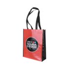 A red and black tote bag with black handles. The front features a circular logo with a diver silhouette and the text I AM A SCUBA DIVER.