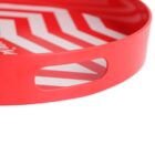 Close-up of a red round tray featuring angled white stripes inside. The tray has an oval cut-out handle visible on the side.