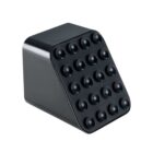 A black, angled, rectangular block with circular indents in a grid pattern on one side. The design resembles a minimalist, modern art piece or a functional object.