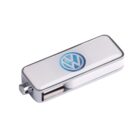 A rectangular USB drive with a glossy white finish features a blue and silver circular logo on its surface. The design is sleek and modern, with a metallic connector partially visible on one end.