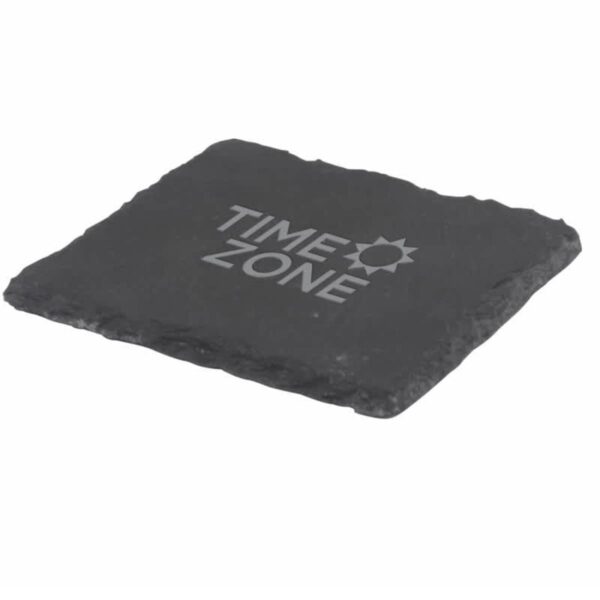 A square black coaster with rough edges features the words TIME ZONE and a sun symbol in white.