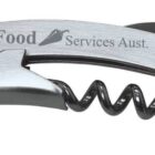 A metallic corkscrew with a foil cutter and a lever. The text Food Services Aust. is printed on the handle.
