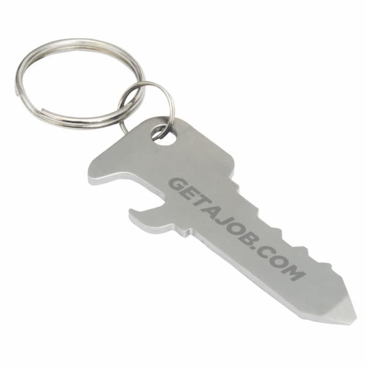 A silver key-shaped bottle opener with the website GETAJOB.COM engraved on it, attached to a metal key ring.