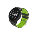 Smartwatch with a black round face and neon green accents, displaying time as 24:04. The strap is black and neon green with perforations. The screen shows date, steps, and calorie count.