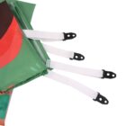 Close-up of a green fabric with white straps and black plastic hooks. The fabric features abstract colorful patterns including red shapes. The straps are neatly aligned and attached to one end of the fabric.