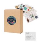 A brown package with a Thank you sticker, adorned with floral and flamingo designs. Numerous colorful stickers are displayed above, featuring hearts, flowers, and various patterns. Text reads: ADD ON STICKERS *STICKERS CAN BE CUSTOMIZED ACCORDINGLY TO YOUR PACKAGES.