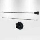 Disassembled black car antenna with two long rods and a circular base, arranged against a plain white background.