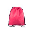 A bright pink drawstring bag with thin black strings, visible against a white background. The bag has a simple, smooth texture and is slightly gathered at the top where the strings are tightened.