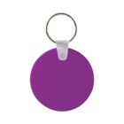 A round, purple keychain with a smooth surface. It is attached to a metal ring by a small, white plastic connector.