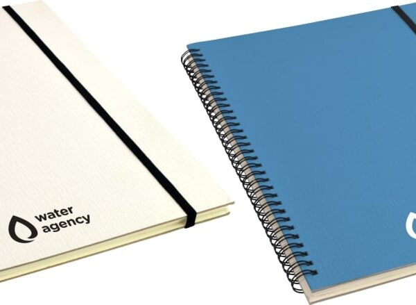 Two spiral-bound notebooks with elastic closures. One is white, and the other is blue. Both have the water agency logo featuring a water droplet on the cover.