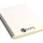 A spiral-bound notebook with a white cover featuring the word MAPS and a circular logo.