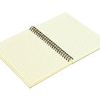 An open spiral-bound notebook with lined pages, laying flat on a white background.