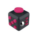 A black fidget cube with pink accents, featuring buttons, a switch, a silver ball, and other tactile surfaces for stress relief or concentration enhancement.