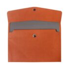 Open orange envelope with a grey interior flap, featuring a button snap closure.