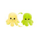 Two plush octopus toys on a white background. The left octopus is yellow with a happy face. The right octopus is green with an angry face. Two curved arrows between them suggest a reversible design.