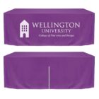 Purple tablecloths featuring the Wellington University logo and the text College of Fine Arts and Design. The logo includes a white building icon.