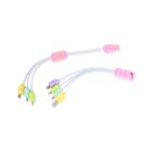Two USB-type rainbow adapters with pastel-colored connectors and a McDonalds logo. Each adapter has four different connectors in pink, yellow, green, and blue. The design features block-like elements on the connectors.