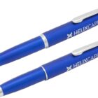Two blue pens with silver clips. One is a ballpoint pen, and the other is a stylus pen. Both have HELIX CAPITAL printed in white along the body.