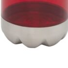 Close-up of the bottom of a red bottle with a smooth, silver metallic base. The bottle is cylindrical, and the base has a curved edge resembling a blossom pattern. The red section is translucent, revealing a hint of the liquid inside.