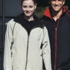 Two people smiling, wearing casual outdoor jackets. The woman is in a light-colored jacket, and the man is in a dark jacket with a red lining. The word CASUAL is prominently displayed at the bottom. The brand BOCINI is at the top left.