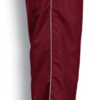 Burgundy track pants with a white stripe running down the side. The pants have an elastic waistband and adjustable ankle closures.