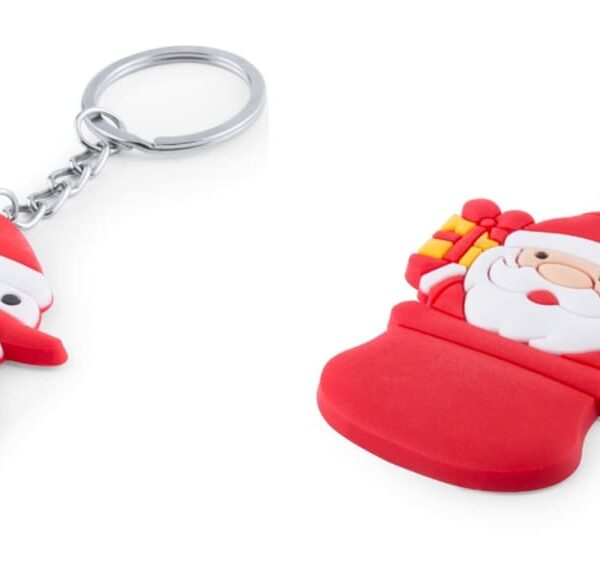 Two festive keychains are shown. The left features a snowman wearing a red Santa hat and scarf, and the right displays Santa Claus with a red stocking and present. Both have silver key rings attached.