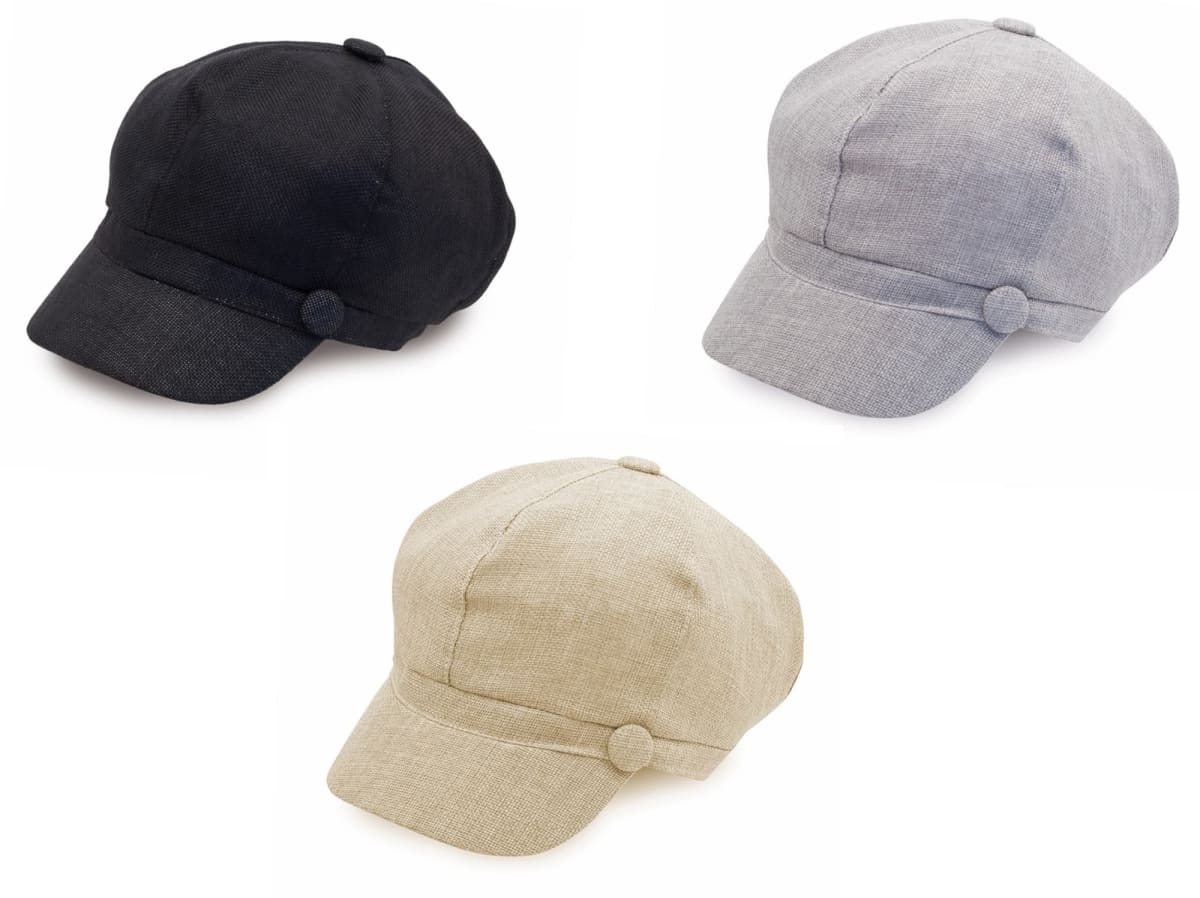Three newsboy caps are displayed against a white background: one black, one gray, and one beige. Each cap features a round button detail on the side.