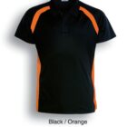 Black polo shirt with orange side and shoulder panels on a white background. The text beneath reads Black / Orange.