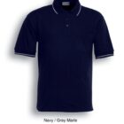Navy blue polo shirt with short sleeves, featuring a grey marle trim on the collar and cuffs. It has a chest pocket and a button-up placket. Text below reads: Navy / Grey Marle.
