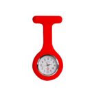 A round watch with a white face and black numerals is encased in a red silicone holder with a looped top, resembling a keychain or badge holder. The design is simple and modern against a white background.