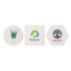 Three coasters arranged horizontally: a circular one with an aloe vera illustration, a square one with a Rockstar logo, and a hexagonal one featuring a leaf design and Lorem Ipsum text.