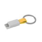 A white USB adapter with a yellow flexible band attached to a silver keyring. The adapter has a lightning connector on one end, while the yellow band loops through a slot on the opposite side, connecting to the keyring.