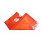 Folded red and orange scarf with white text and abstract design elements, including a stylized figure and curved lines.