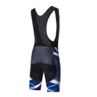 Rear view of a cycling bib shorts featuring a black mesh upper and straps, with a blue, white, and black geometric pattern on the bottom half. The design includes abstract lines and dots for a dynamic appearance.