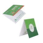 Two ErenBerry branded notepads. One is open with a 2019 win-pad calendar on top, displaying a cartoon character and icons. The other is closed, featuring a green gradient cover and the ErenBerry logo with a leaf design.