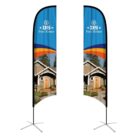 Two vertical real estate banners with a house image at the bottom, featuring a blue background and orange wavy lines. The text DS Real Estate is displayed at the top with a logo. Each banner stands on a cross base.