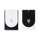 Two wireless charging stands are shown side by side. The left stand is white with a black base, and the right stand is black with a lighter base. Both feature the qi symbol indicating compatibility with Qi wireless charging standards.