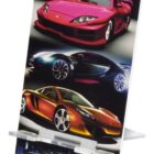 A phone stand featuring images of three high-performance sports cars in various colors, with the text high performance industries at the top.