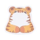Illustrated sticky note in the shape of a sitting tiger with a blank white belly for writing. The tiger has cute, cartoonish features, with big eyes and paws, and a simple brown and orange striped design.
