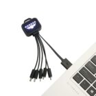 Multi-port USB hub with HANGAR logo, connected to a silver laptop. The hub has six black cables with USB connectors. The laptops keyboard is partially visible, showing the EliteBook label.