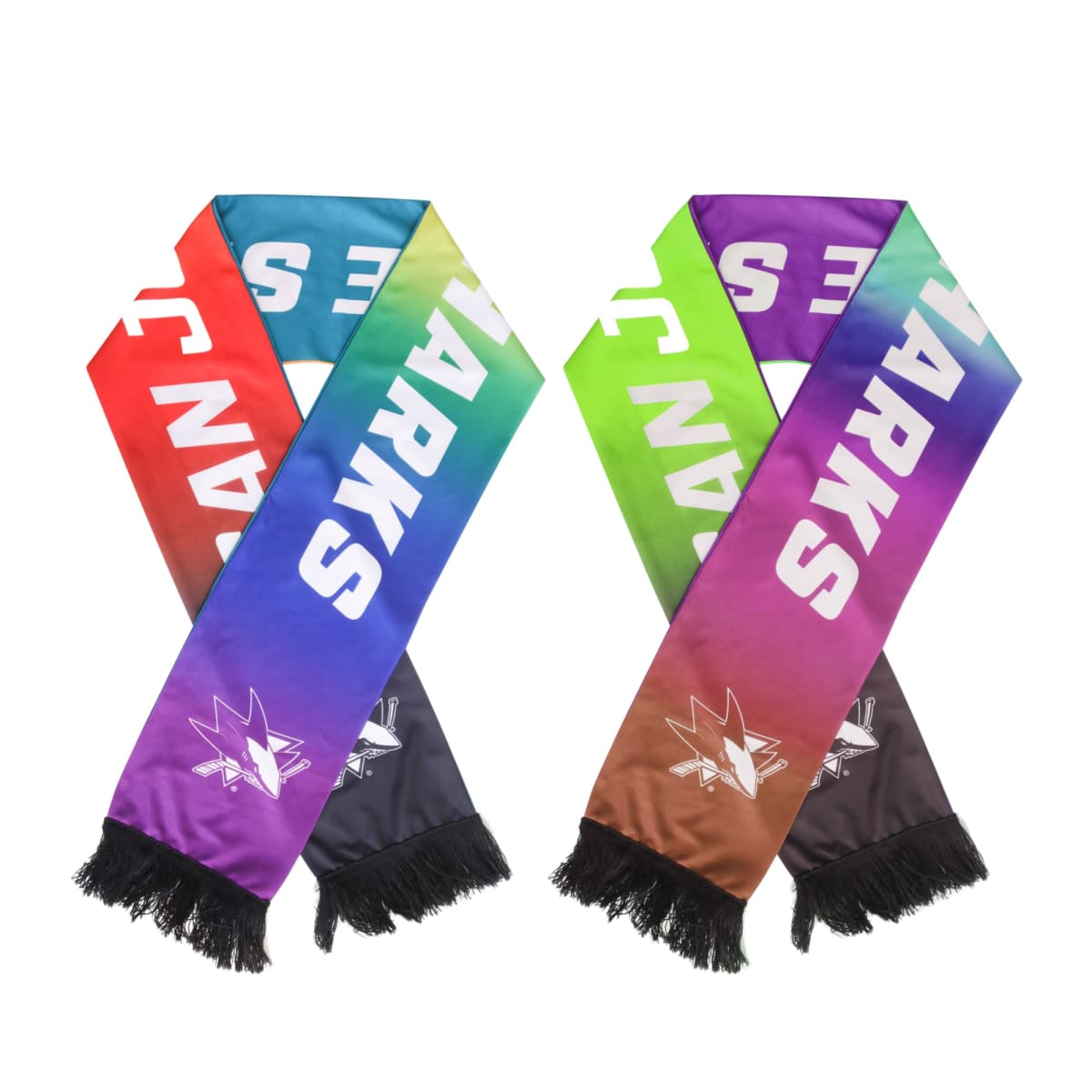 Two colorful San Jose Sharks scarves with gradient designs. The left scarf transitions from blue to red, while the right one transitions from purple to green. Both feature the team logo and black tassels at the ends.