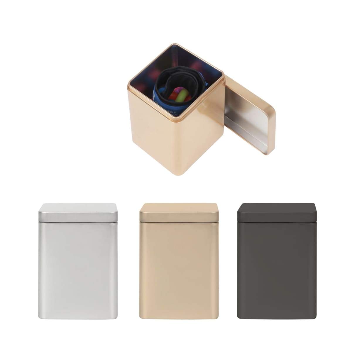 Four metallic square containers with lids, in silver, gold, and dark gray colors. One container is open, showing a rolled-up pair of colorful socks inside. The containers have a sleek and modern design.