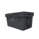 Dark gray insulated cooler with handles and latches. Rectangular shape with a logo embossed on the side. Used for keeping items cold, featuring sturdy construction and secure closures.