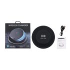 Wireless charger set includes a black charging pad, a USB cable, and an instruction manual. The packaging shows the charger with a blue glow. The words Wireless Charger are printed on the box.